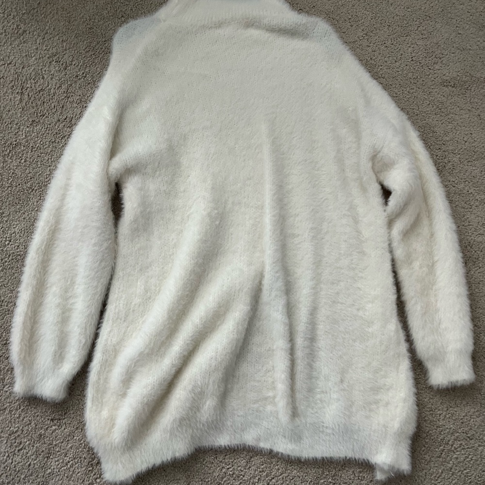Comfy furry cream sweater perfect for winter, never worn!